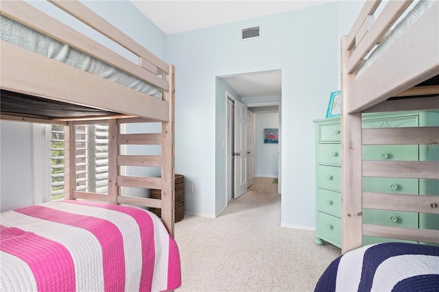 bedroom with light carpet