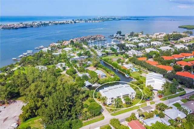 drone / aerial view featuring a water view