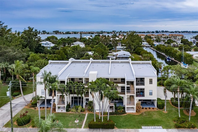 bird's eye view with a water view