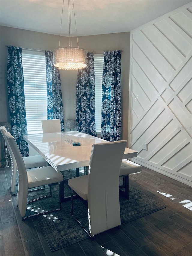 dining area featuring dark wood-type flooring