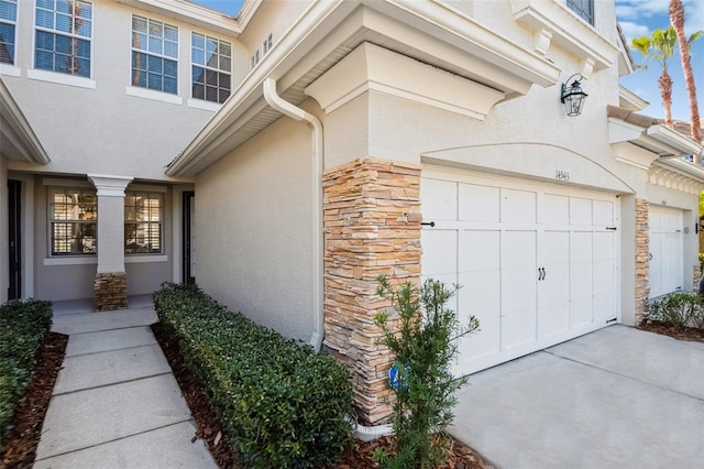 view of property exterior with a garage