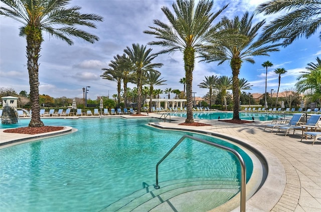 view of swimming pool featuring a patio area