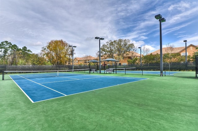 view of sport court with a gazebo