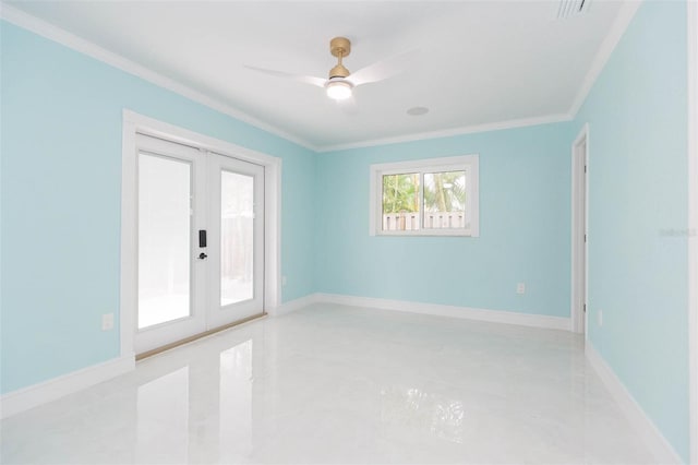 spare room with crown molding, ceiling fan, and french doors