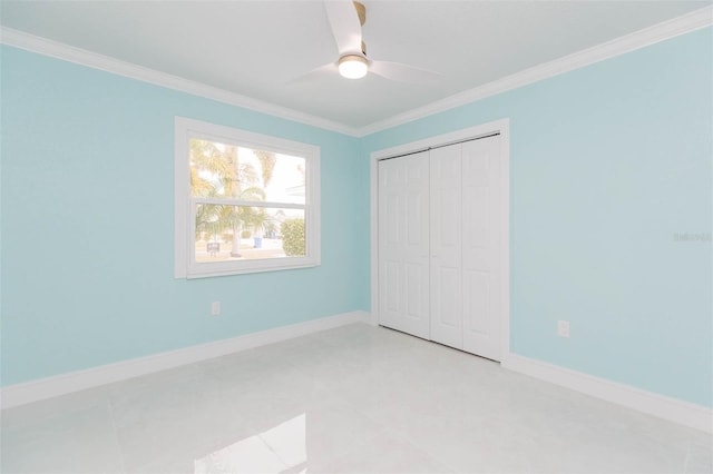 unfurnished bedroom featuring ornamental molding, a closet, and ceiling fan