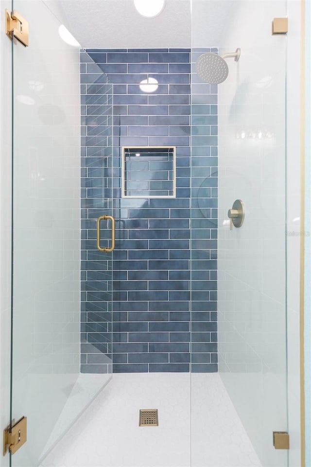 bathroom with walk in shower