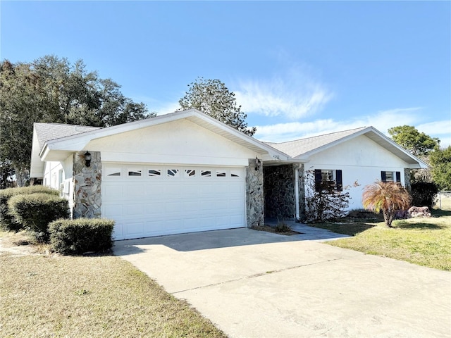 single story home with a garage and a front yard