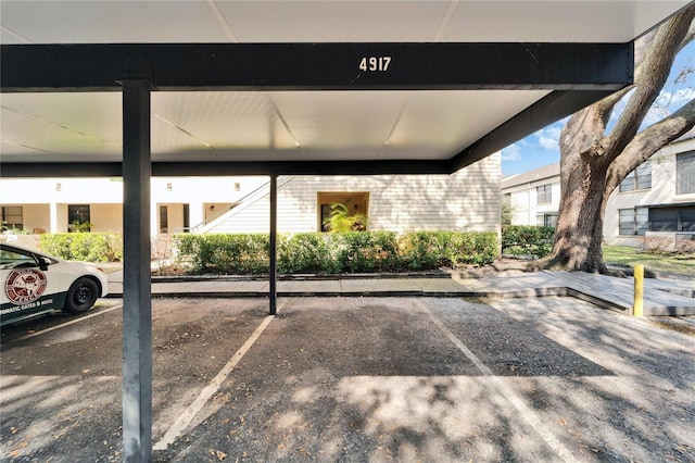 view of car parking with a carport