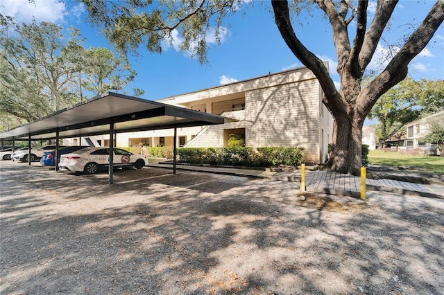 view of parking with a carport