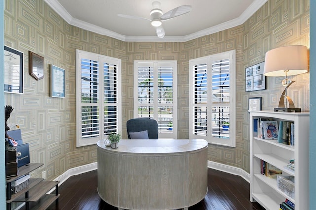 home office featuring dark wood-type flooring, ceiling fan, and crown molding