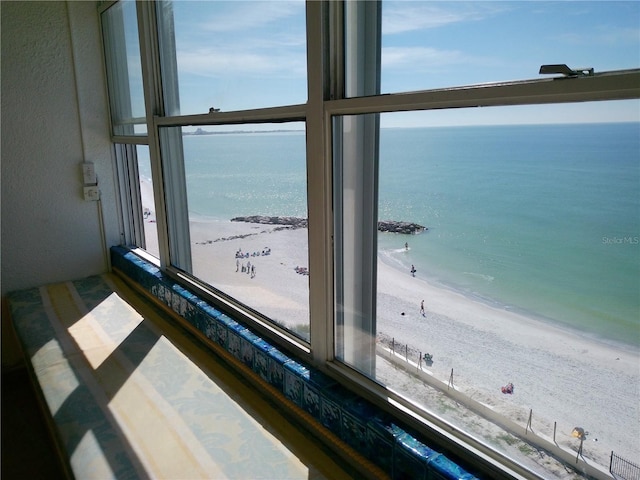 property view of water featuring a beach view