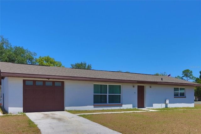 5729 13th St, Zephyrhills, FL 33542 - ranch-style house with concrete driveway, a garage, and a front lawn