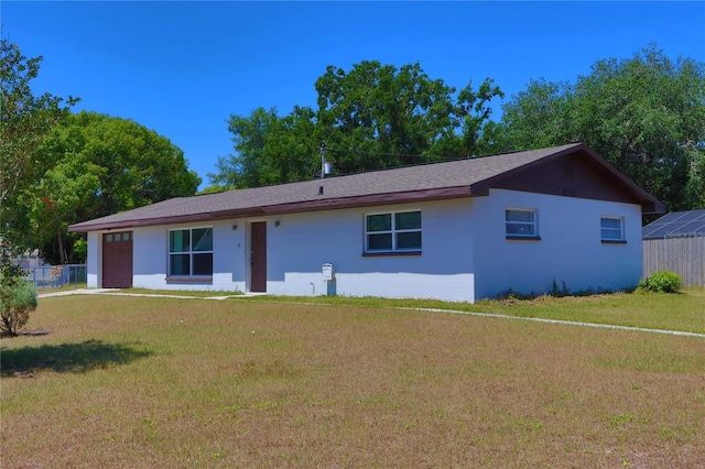 5729 13th St, Zephyrhills, FL 33542 - single story home with a front yard and a garage