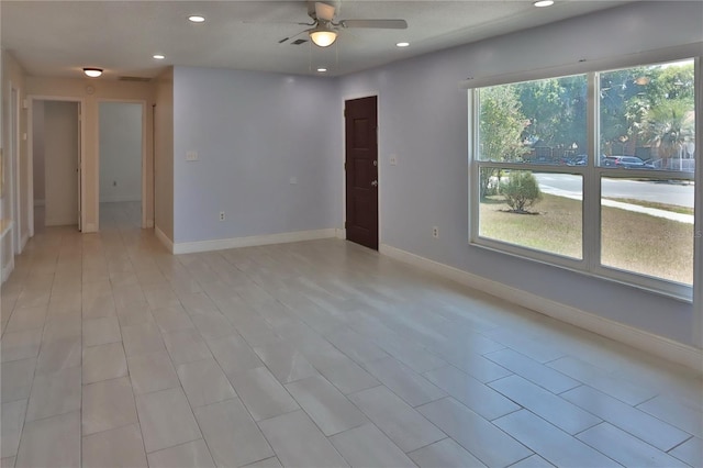 5729 13th St, Zephyrhills, FL 33542 - spare room with ceiling fan, recessed lighting, and baseboards