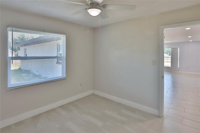 5729 13th St, Zephyrhills, FL 33542 - spare room featuring ceiling fan, baseboards, light tile patterned floors, and recessed lighting