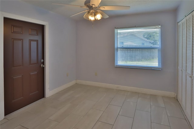 5729 13th St, Zephyrhills, FL 33542 - empty room featuring a ceiling fan and baseboards