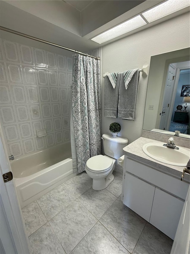 full bathroom featuring shower / tub combo, vanity, tile patterned flooring, and toilet