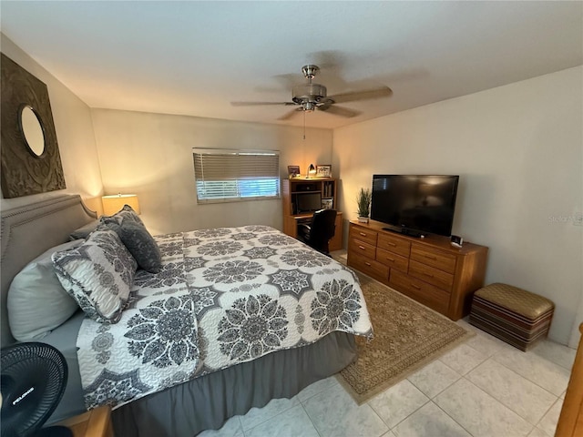 bedroom with light tile patterned floors and ceiling fan