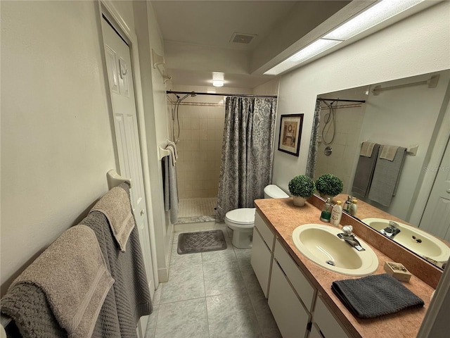 bathroom with vanity, tile patterned flooring, toilet, and a shower with shower curtain