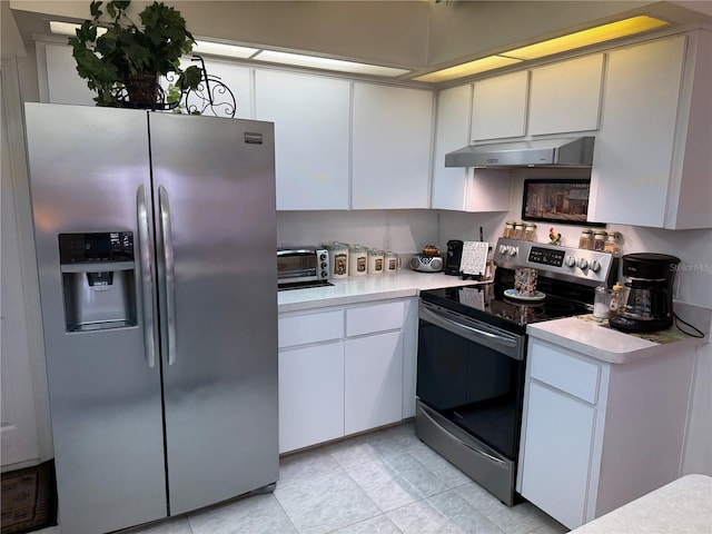 kitchen with white cabinetry and stainless steel appliances