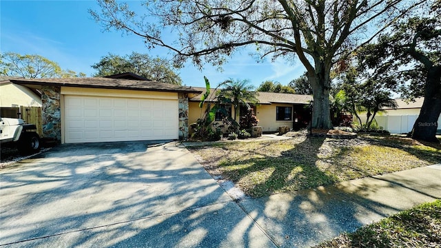 single story home featuring a garage