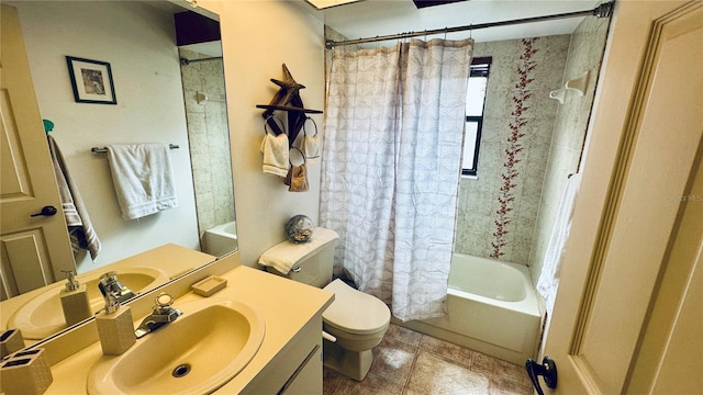 full bathroom featuring shower / tub combo, vanity, tile patterned floors, and toilet