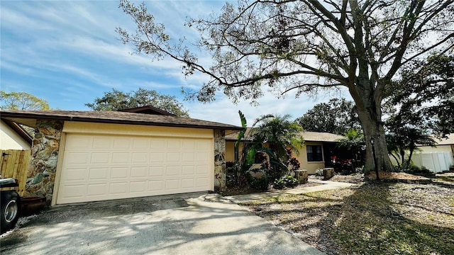 ranch-style home with a garage