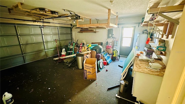 1670 Monterey Dr, Clearwater, FL 33756 - garage featuring water heater, a garage door opener, and electric panel