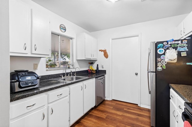 kitchen featuring white cabinetry, sink, and stainless steel appliances