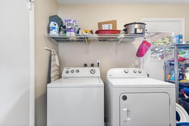 laundry area with washer and dryer