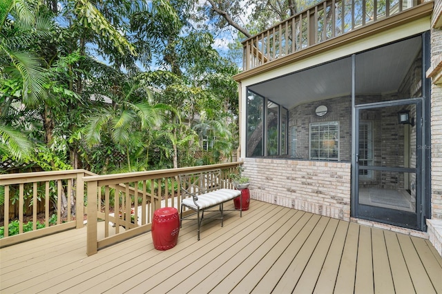 deck featuring a sunroom