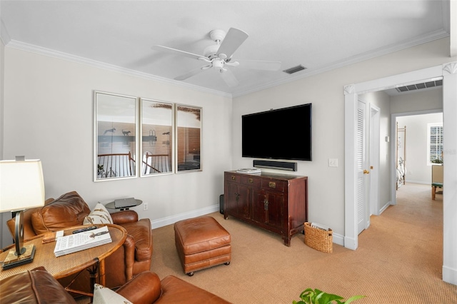 living room with light carpet, crown molding, and ceiling fan