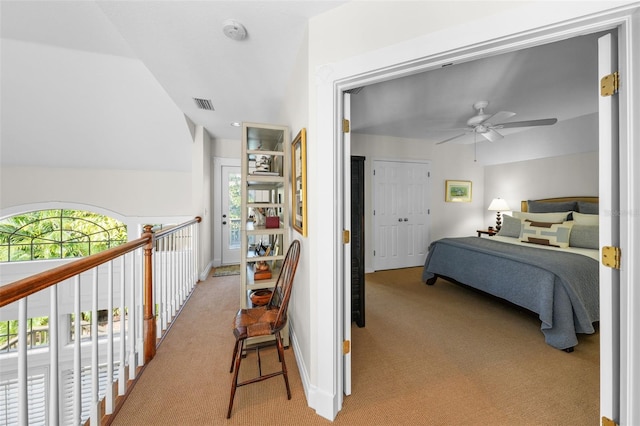 carpeted bedroom featuring ceiling fan