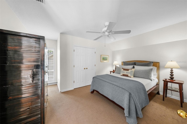 bedroom with ceiling fan and carpet flooring