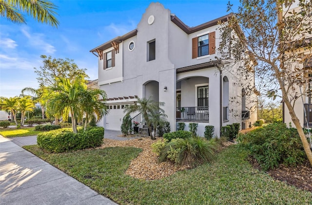 mediterranean / spanish-style house featuring a garage