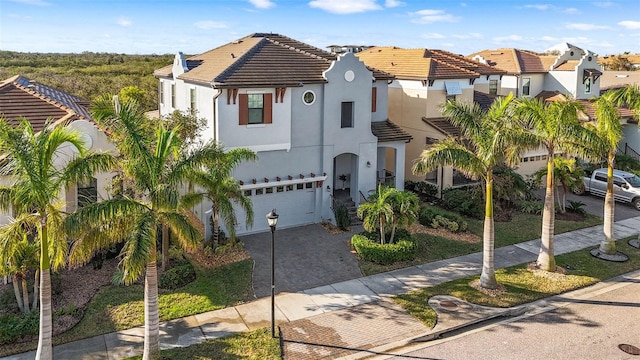 view of front of home with a garage