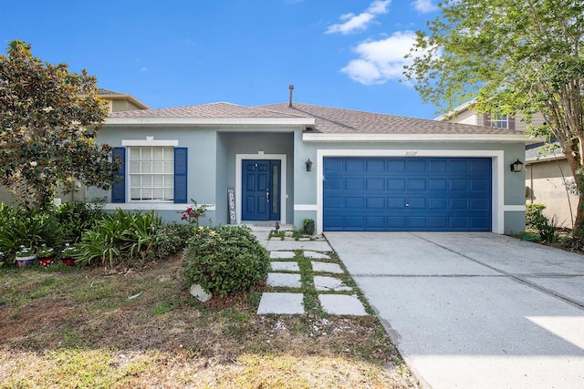 view of front of home with a garage