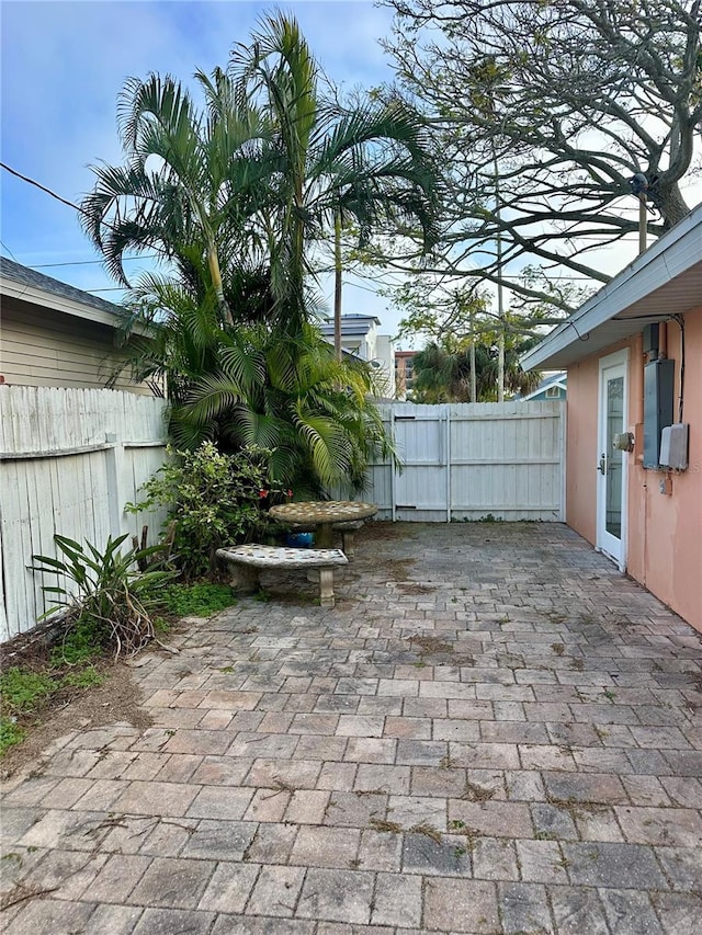 view of patio / terrace featuring electric panel