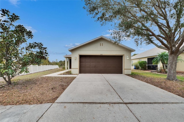 ranch-style house featuring a garage