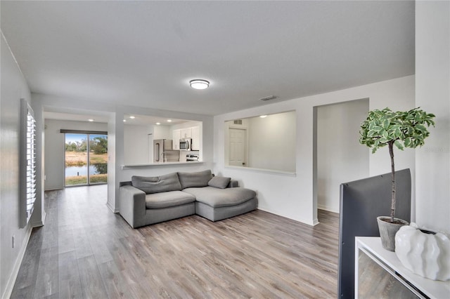 living room featuring light wood-type flooring