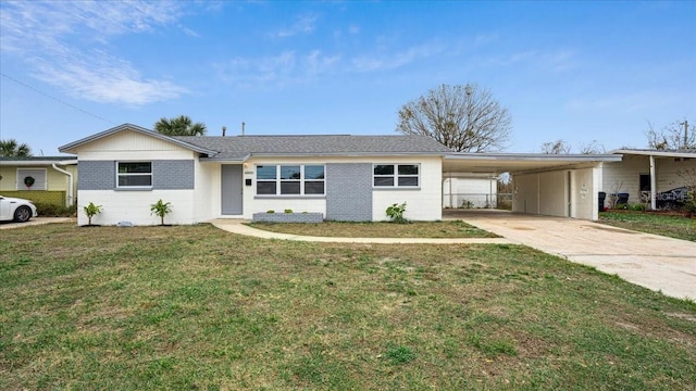 ranch-style house with a carport and a front yard