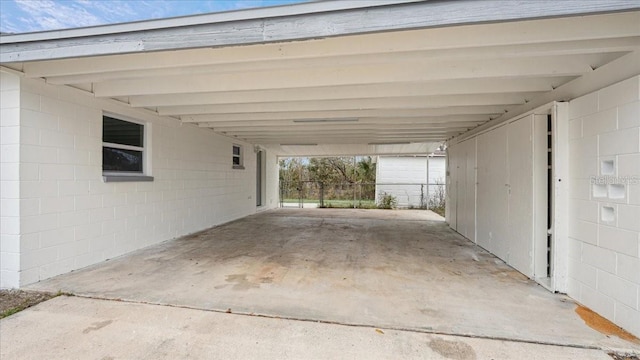 exterior space with a carport