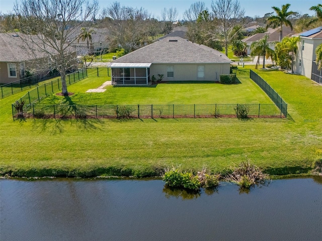 drone / aerial view featuring a water view