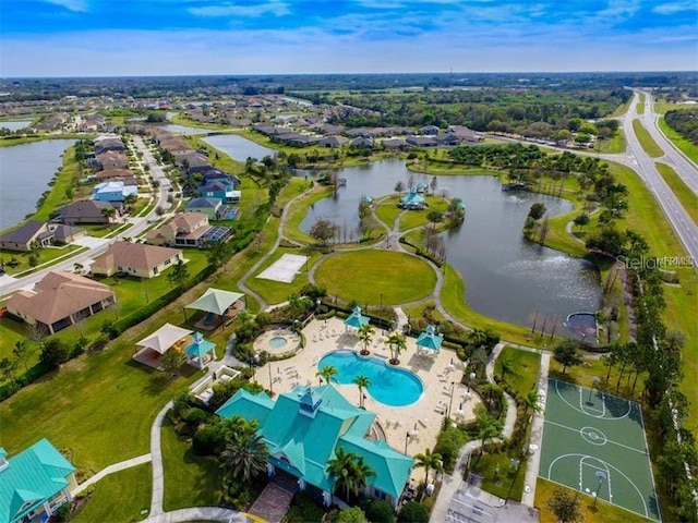 drone / aerial view with a water view