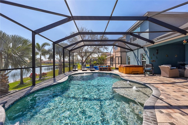 outdoor pool featuring a lanai, a patio area, a water view, and a hot tub