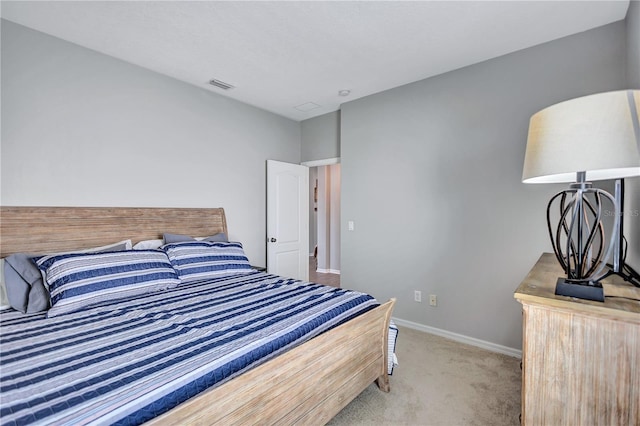 bedroom featuring carpet flooring, baseboards, and visible vents