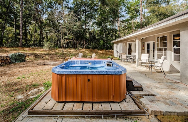 exterior space featuring a hot tub