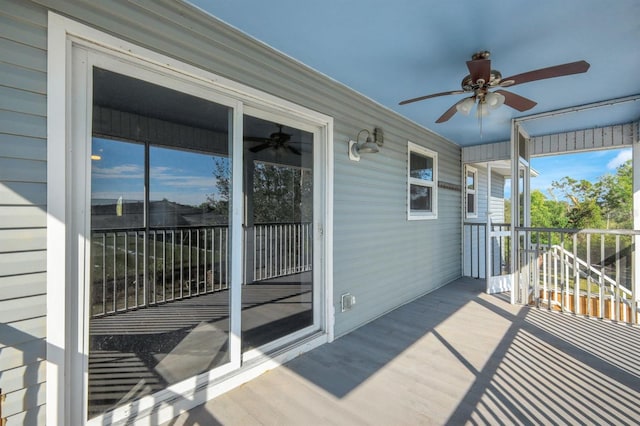 wooden deck with ceiling fan