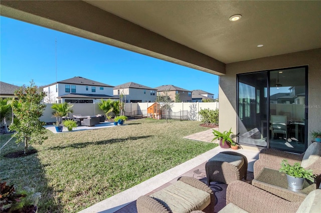 view of yard with an outdoor hangout area and a patio area