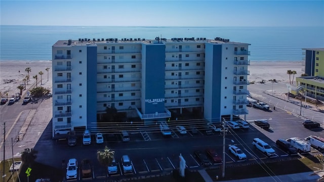 aerial view with a beach view and a water view